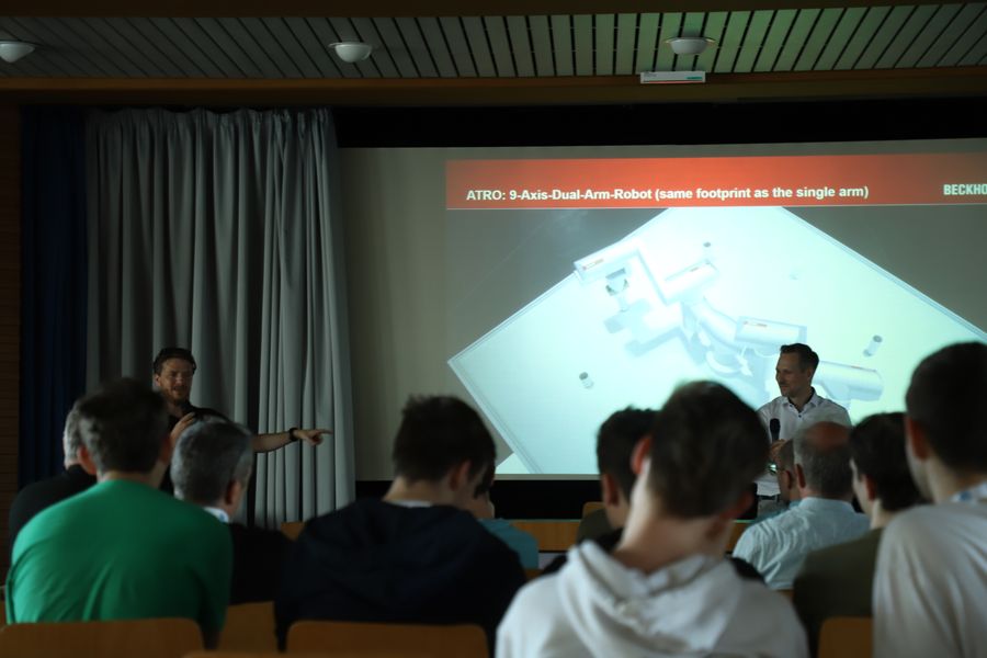 A student presenting their robotics research to the ECER audience